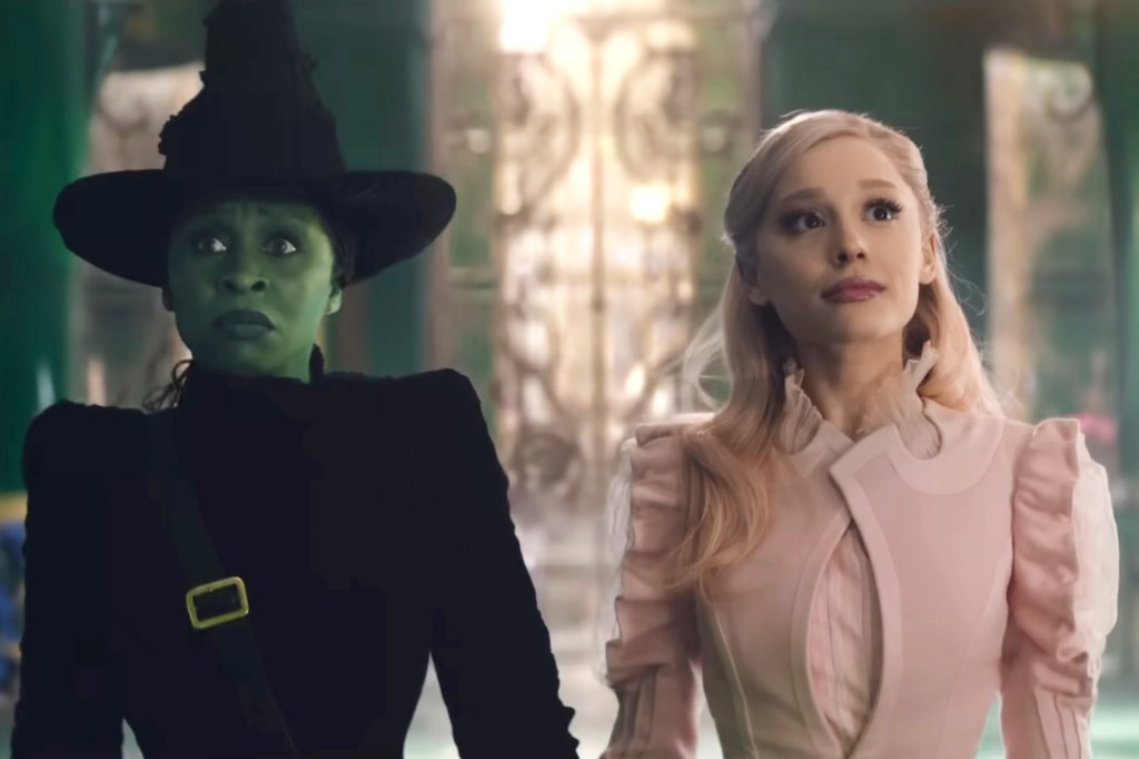 Ariana Grande as Glinda and Cynthia Erivo as Elphaba in the film "Wicked." 